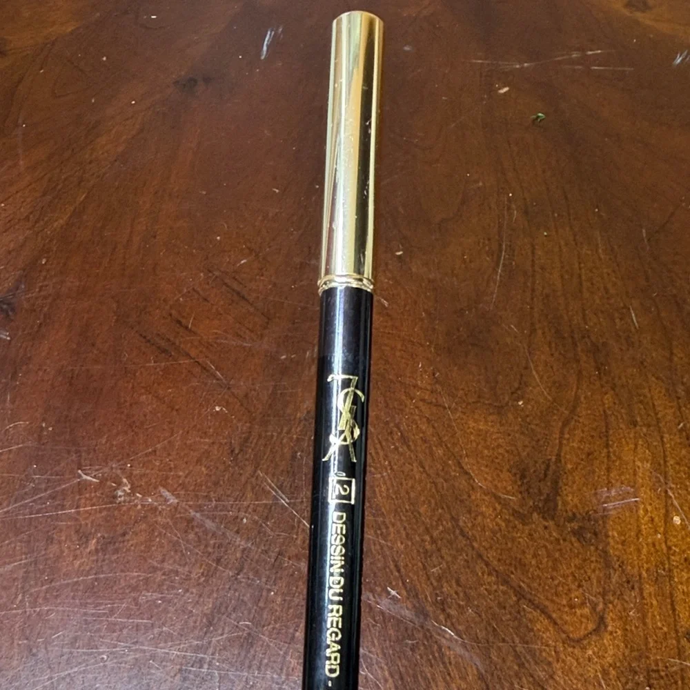 Yves Saint Laurent Gold Compact with‎ Neutral Nude & Brown Eye Pencils.